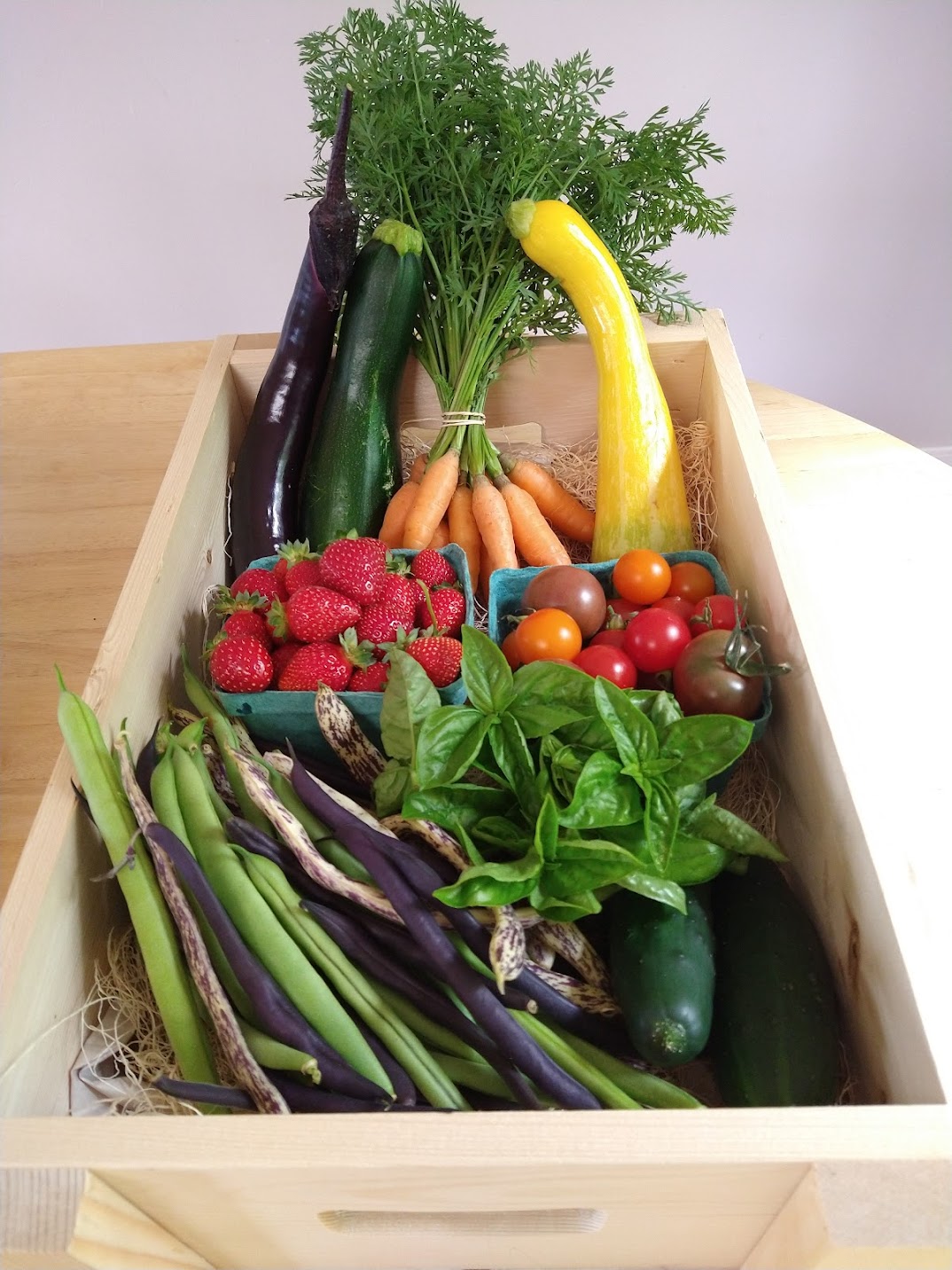 CSA share in a wooden crate